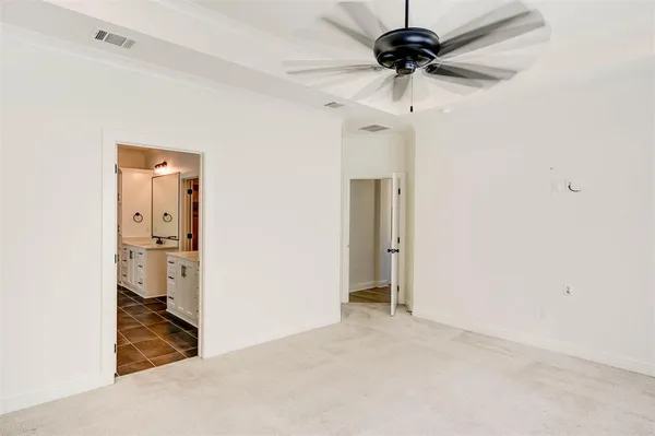 a view of a chandelier fan in a room
