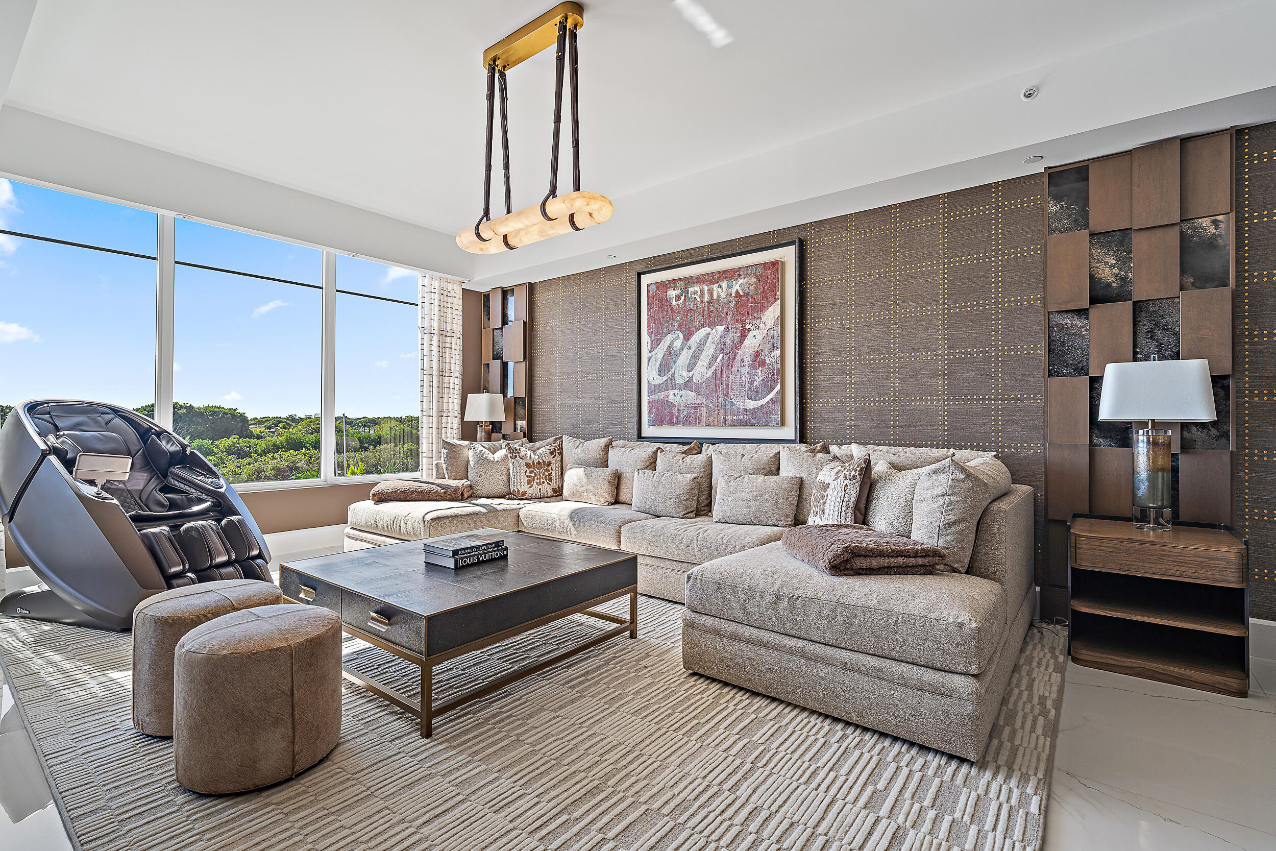 2720 Donald Ross Road, Unit 505 Palm Beach Gardens, FL 33410 - Photo 14 of 43 a living room with furniture a table and a flat screen tv