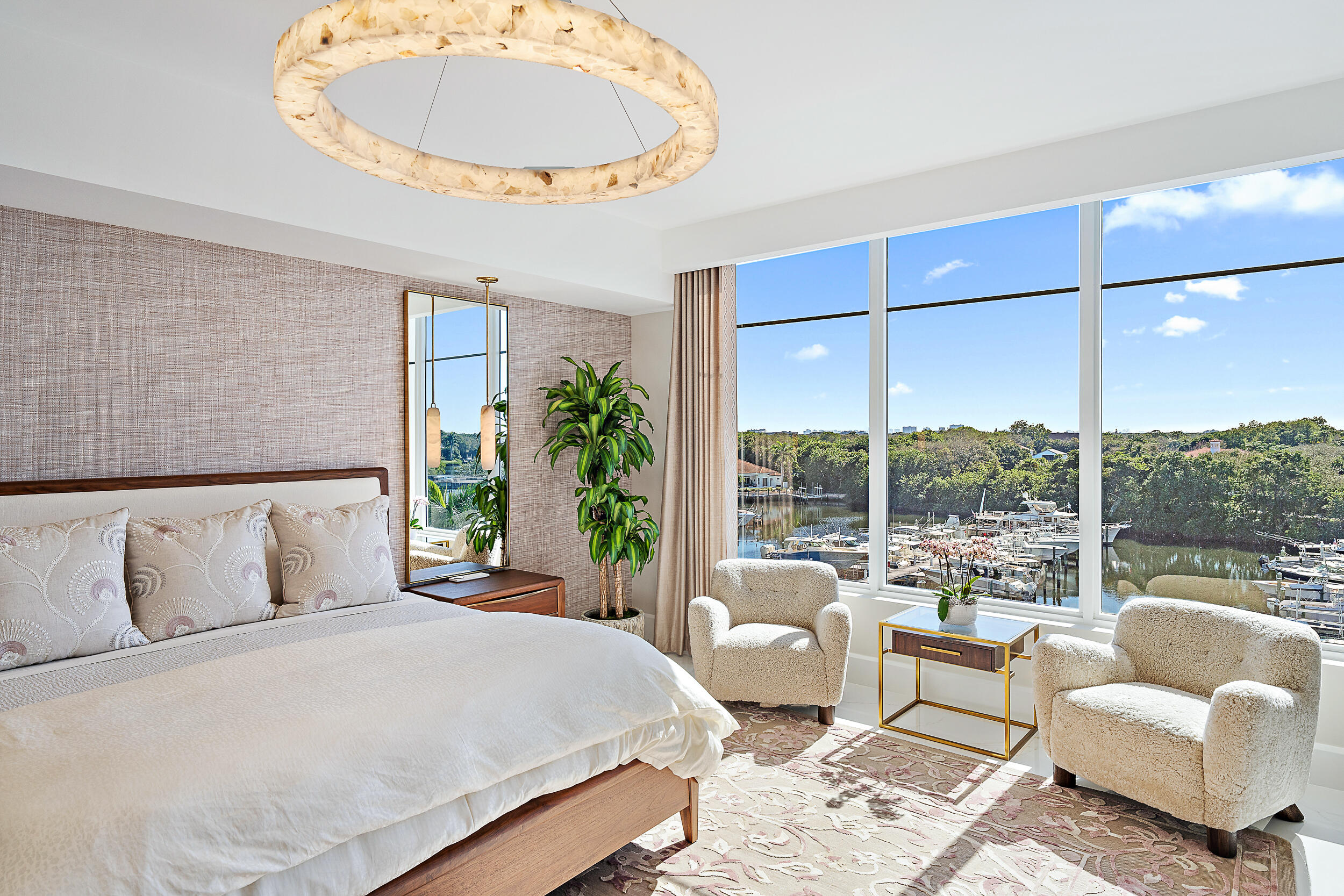 2720 Donald Ross Road, Unit 505 Palm Beach Gardens, FL 33410 - Photo 17 of 43 a bedroom with a bed and a large window