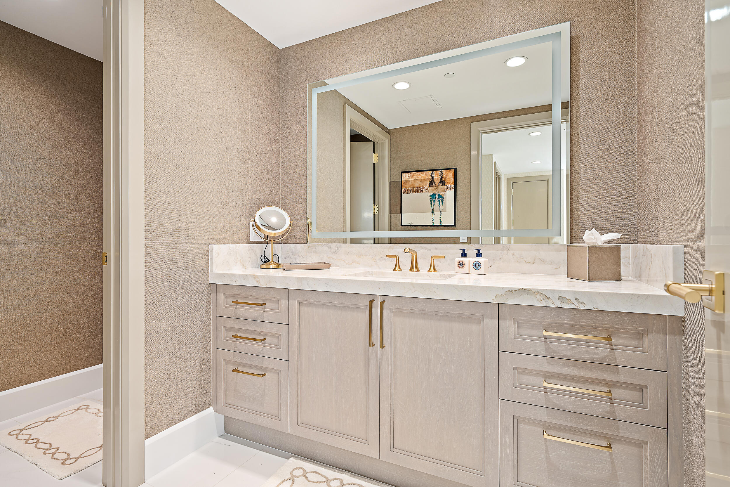 2720 Donald Ross Road, Unit 505 Palm Beach Gardens, FL 33410 - Photo 19 of 43 a bathroom with a sink vanity and mirror