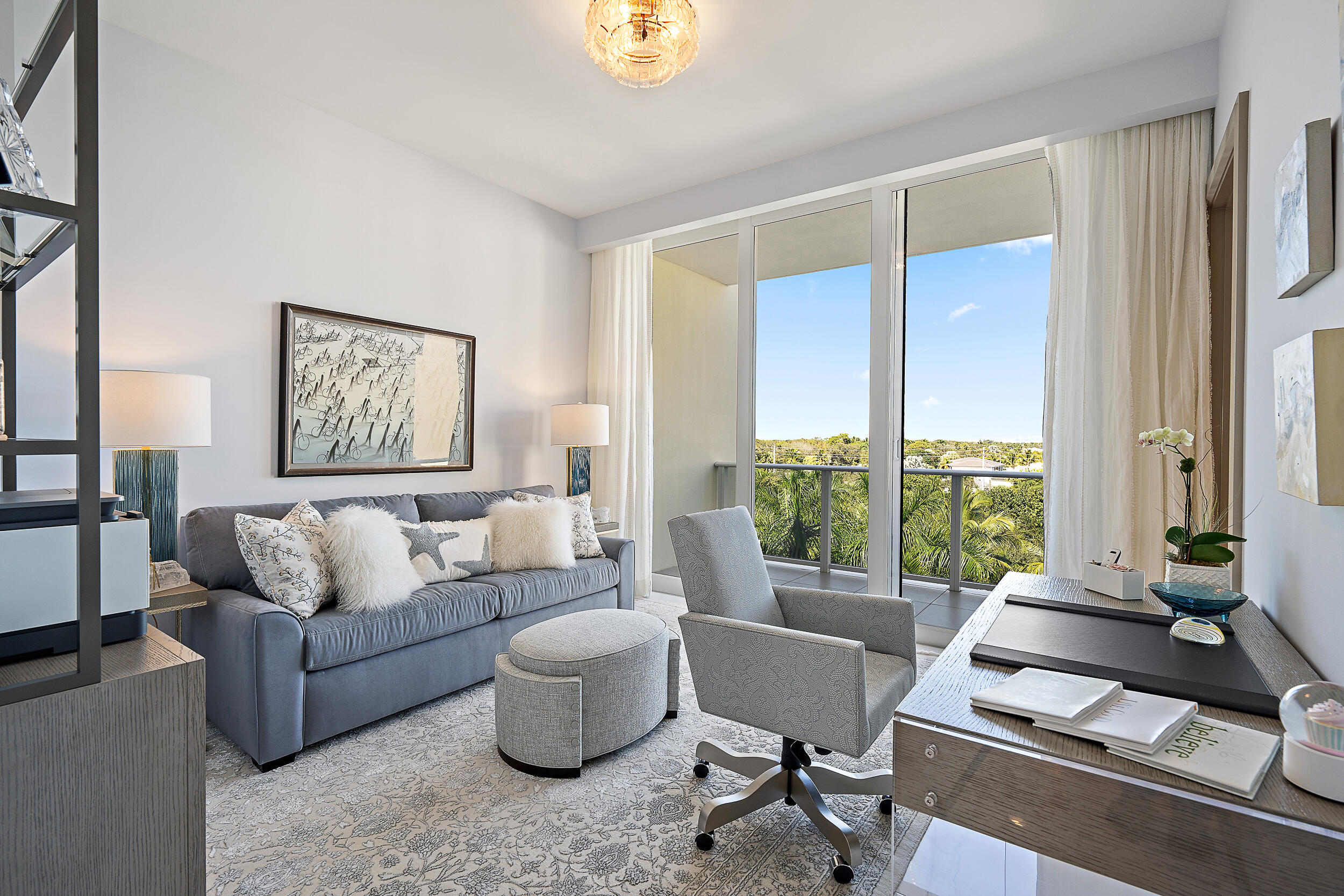 2720 Donald Ross Road, Unit 505 Palm Beach Gardens, FL 33410 - Photo 26 of 43 a living room with furniture and a large window