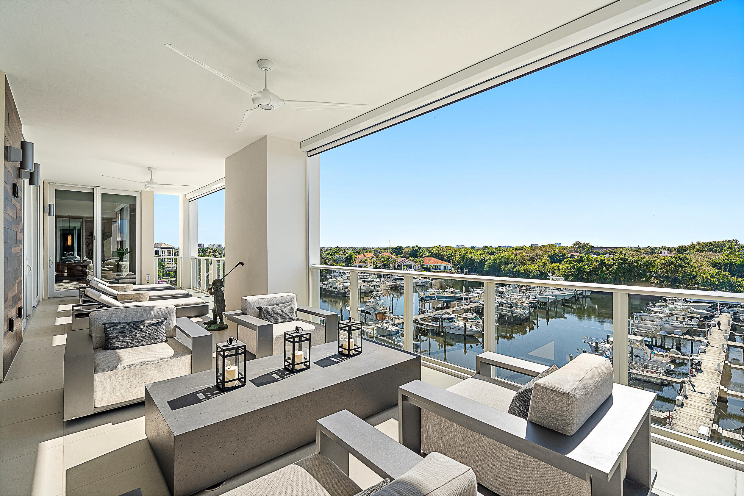 2720 Donald Ross Road, Unit 505 Palm Beach Gardens, FL 33410 - Photo 3 of 43 a view of a roof deck with couches and city view