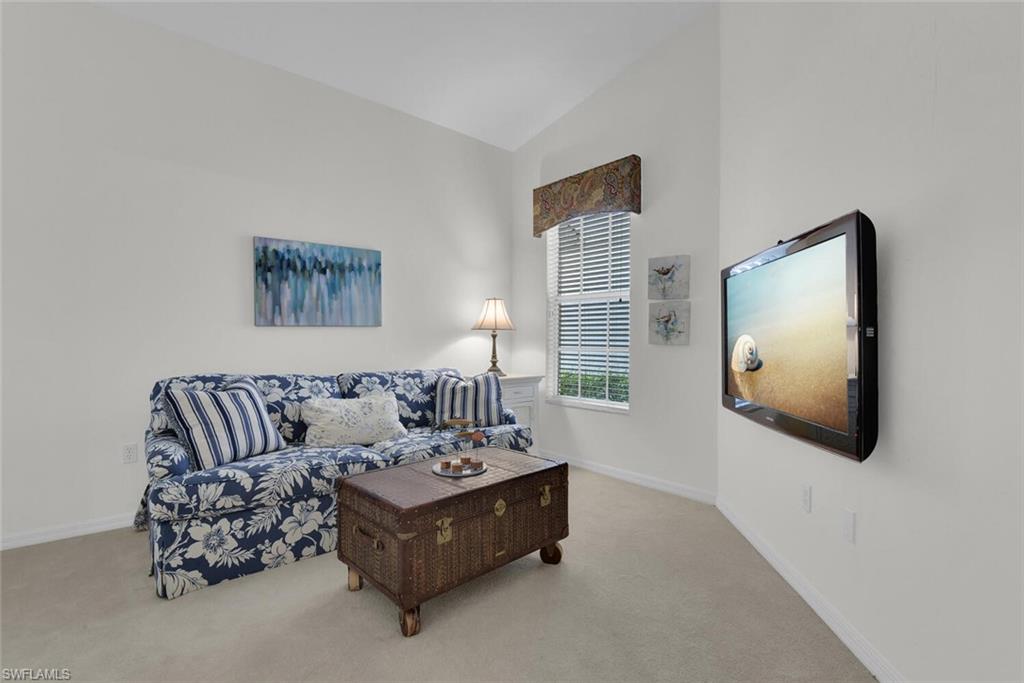 2124 Paget Circle, Unit 1 Naples, FL 34112 - Photo 15 of 31 a living room with furniture
