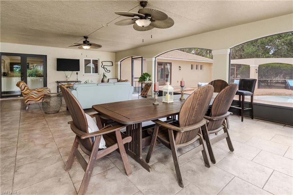 1781 21st Street Southwest Naples, FL 34117 - Photo 13 of 39 a dining room with furniture and window