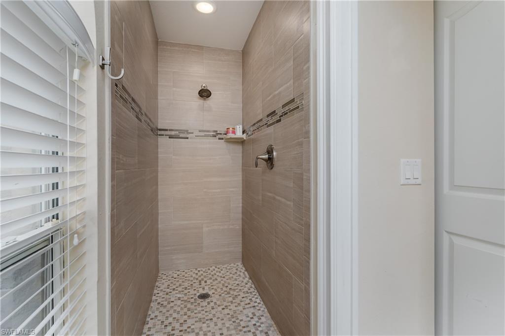 1781 21st Street Southwest Naples, FL 34117 - Photo 23 of 39 a bathroom with a shower and a toilet