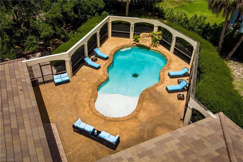 1781 21st Street Southwest Naples, FL 34117 - Photo 38 of 39 an aerial view of a house with swimming pool