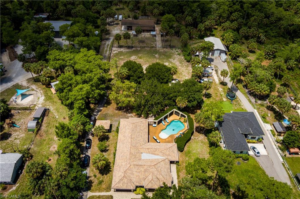 1781 21st Street Southwest Naples, FL 34117 - Photo 39 of 39 an aerial view of residential house with outdoor space and swimming pool