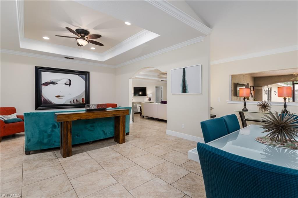 1781 21st Street Southwest Naples, FL 34117 - Photo 6 of 39 a living room with furniture and wooden floor