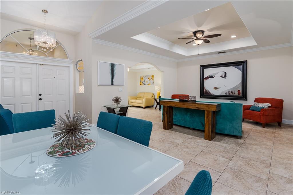1781 21st Street Southwest Naples, FL 34117 - Photo 7 of 39 a living room with furniture and wooden floor