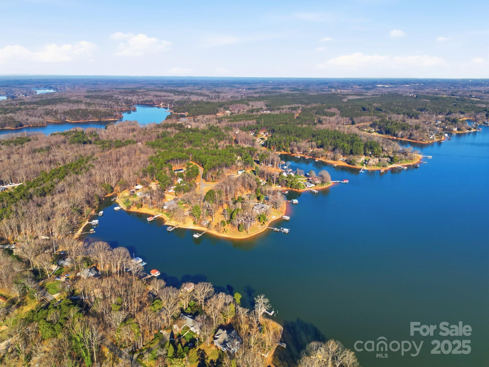 168 Willow Point Road Troutman, NC 28166 - Photo 7 of 16 an aerial view of ocean and residential houses with outdoor space