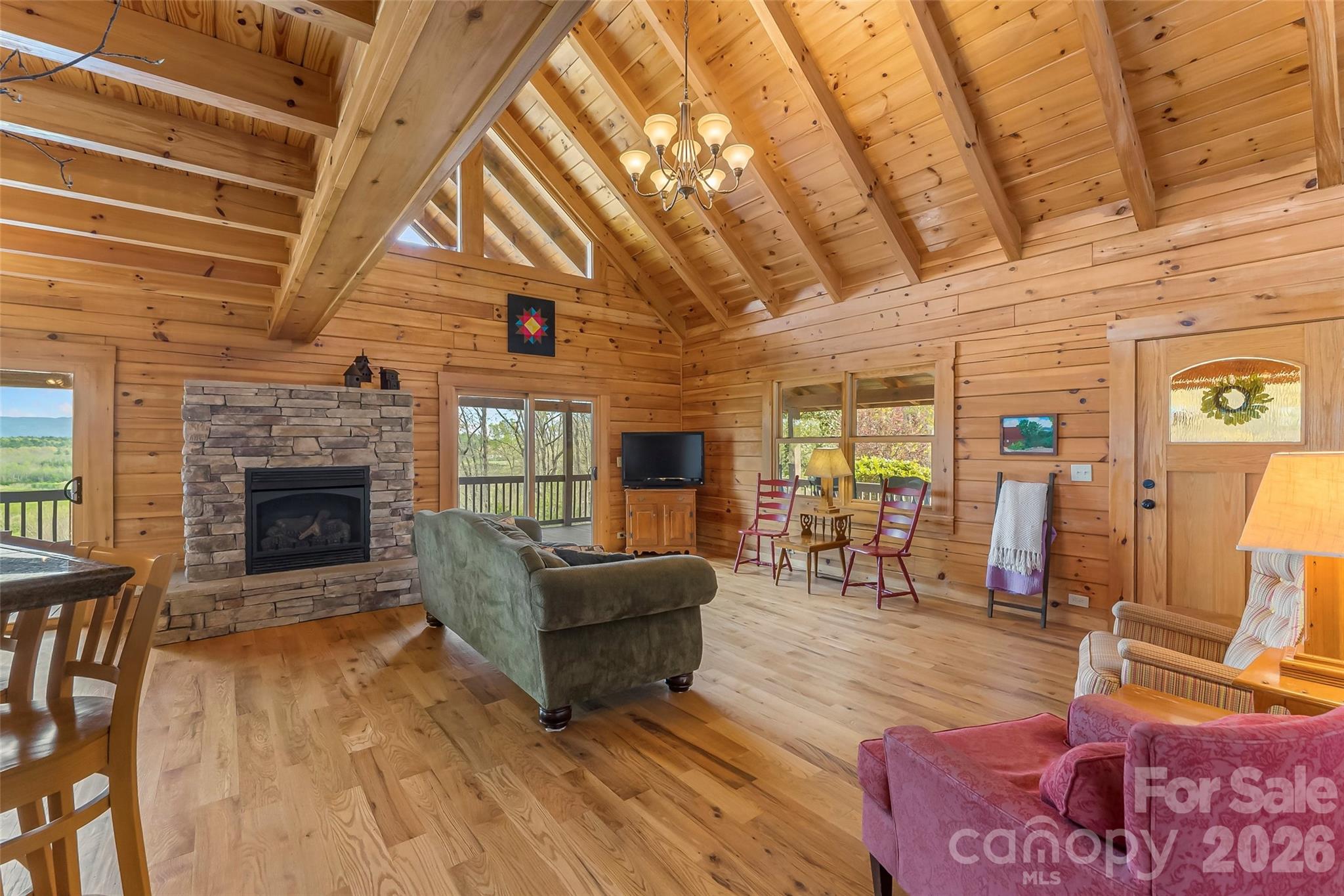 295 Outback Trail, Unit 29 Nebo, NC 28761 - Photo 13 of 46 a living room with furniture and a fireplace