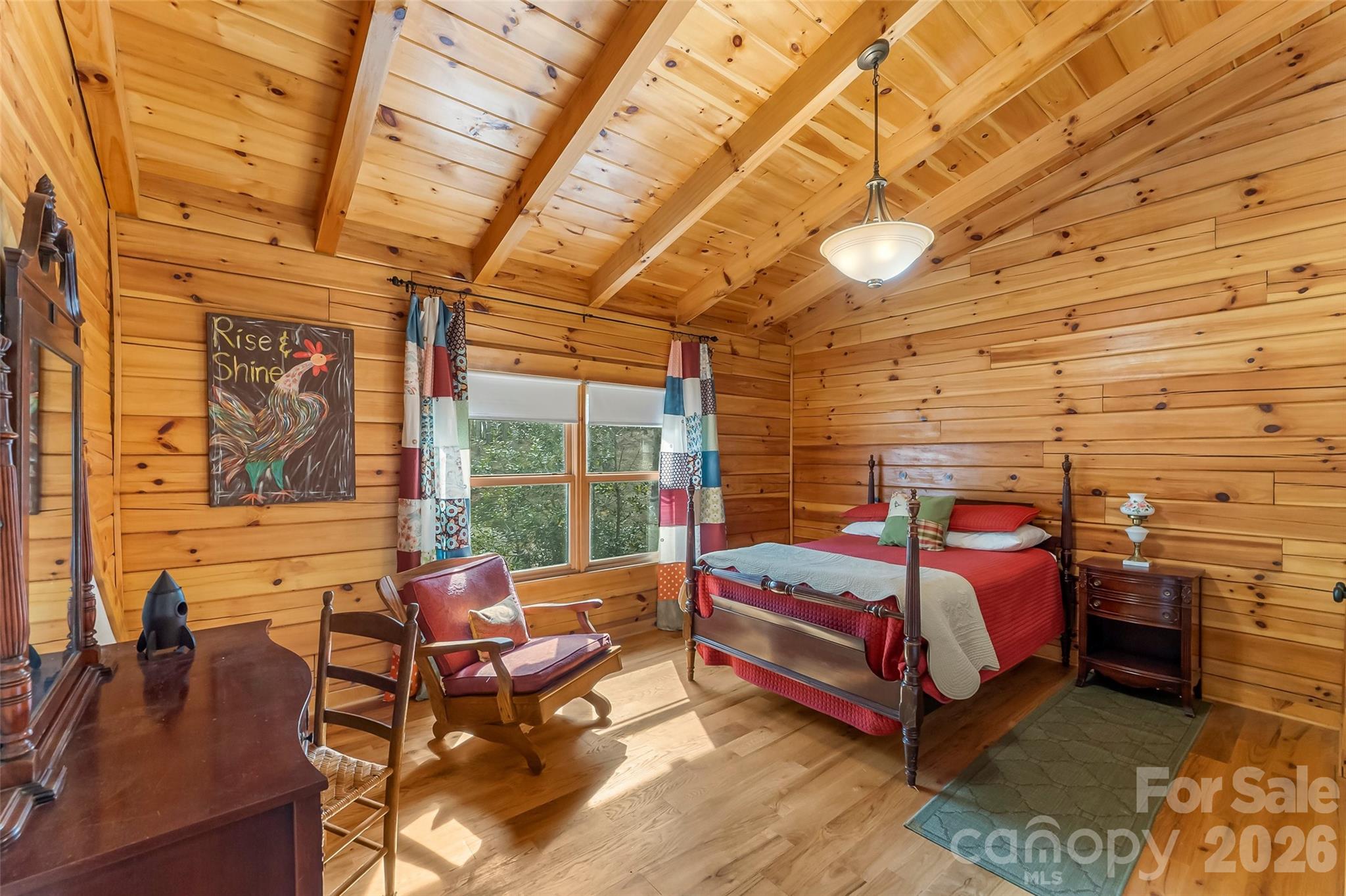 295 Outback Trail, Unit 29 Nebo, NC 28761 - Photo 28 of 46 a bedroom with a bed and wooden floor