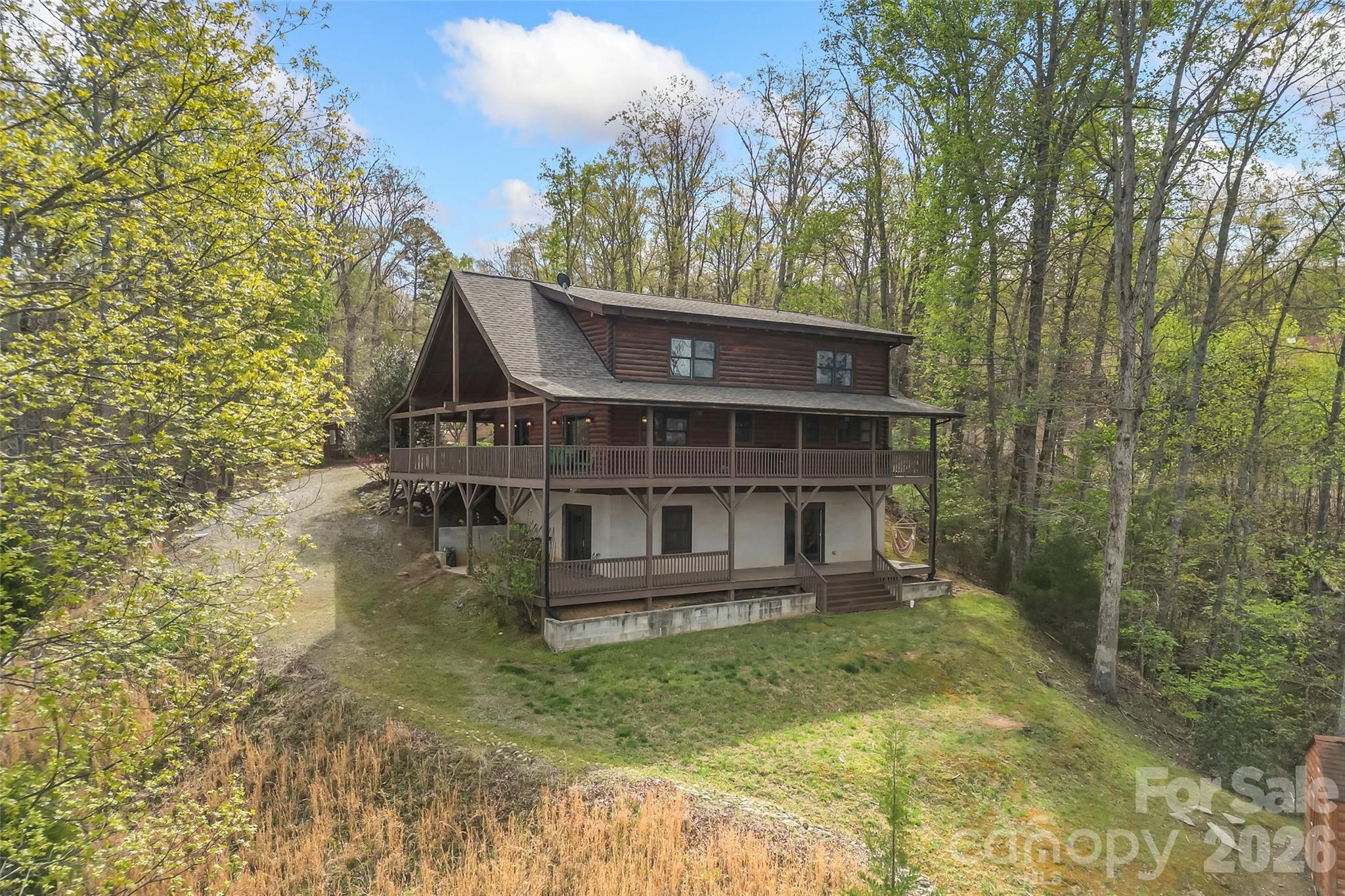 295 Outback Trail, Unit 29 Nebo, NC 28761 - Photo 35 of 46 front view of house with a yard