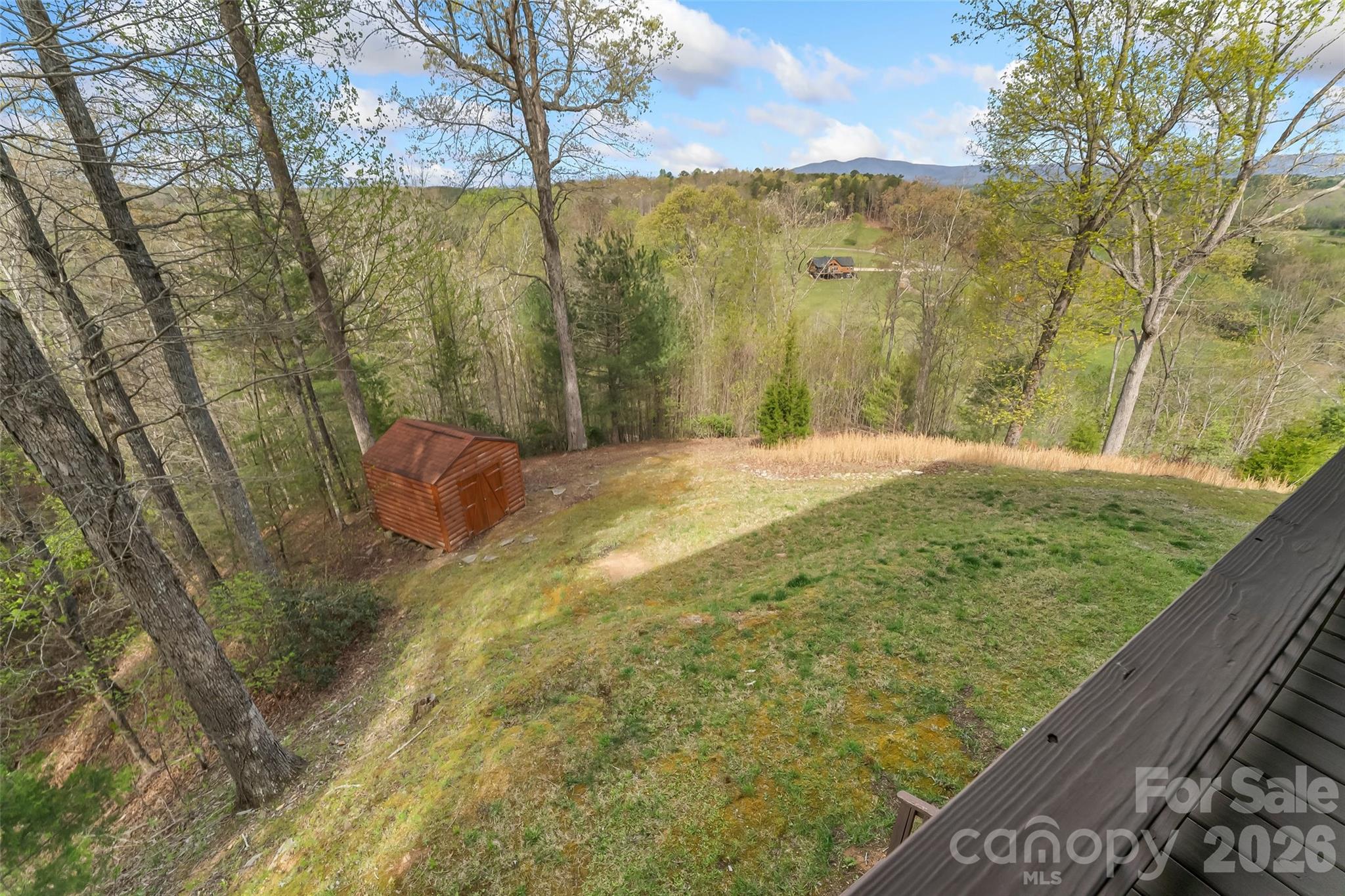 295 Outback Trail, Unit 29 Nebo, NC 28761 - Photo 39 of 46 a view of a yard with an outdoor space