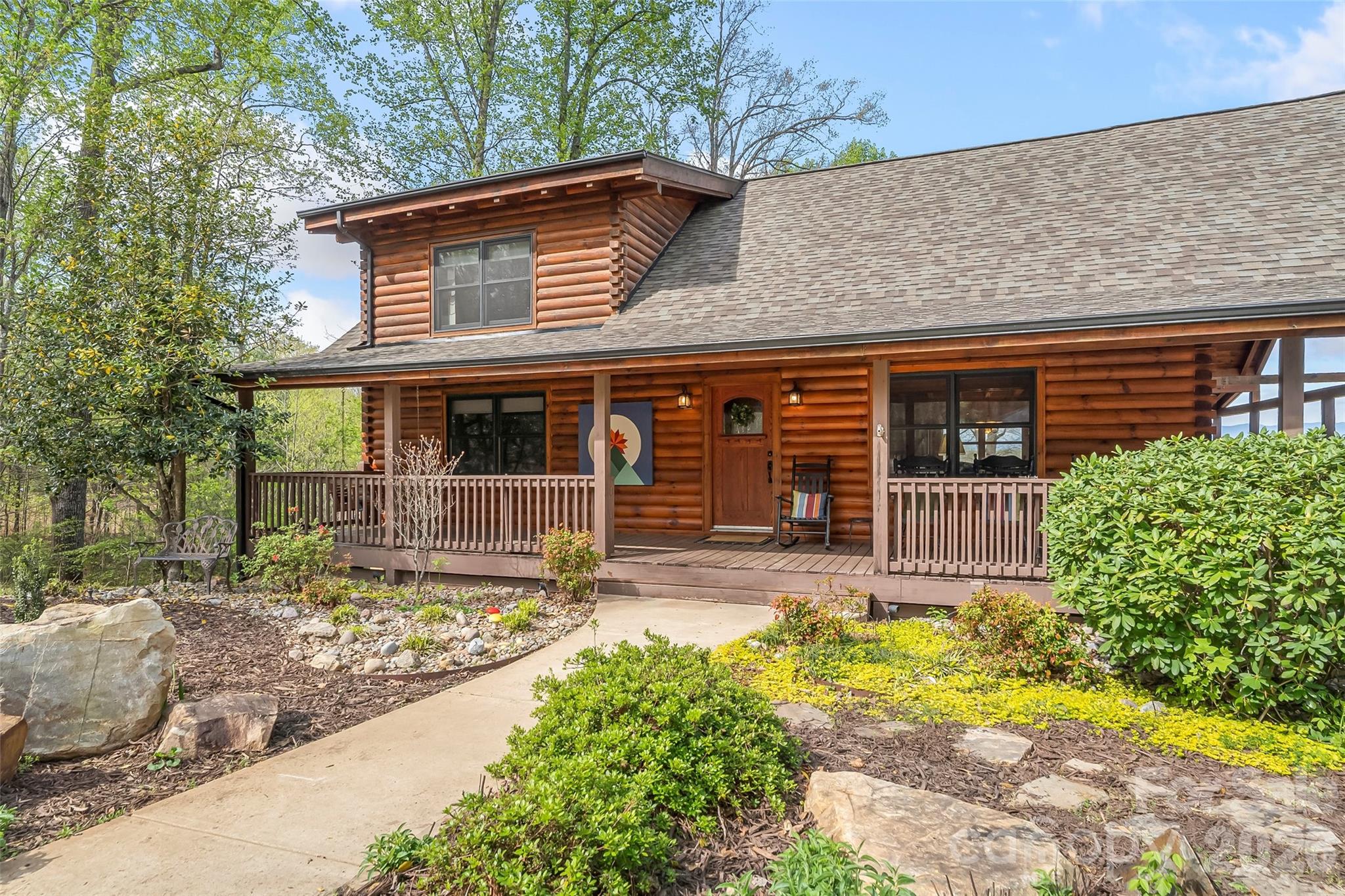 295 Outback Trail, Unit 29 Nebo, NC 28761 - Photo 5 of 46 front view of a house with a yard