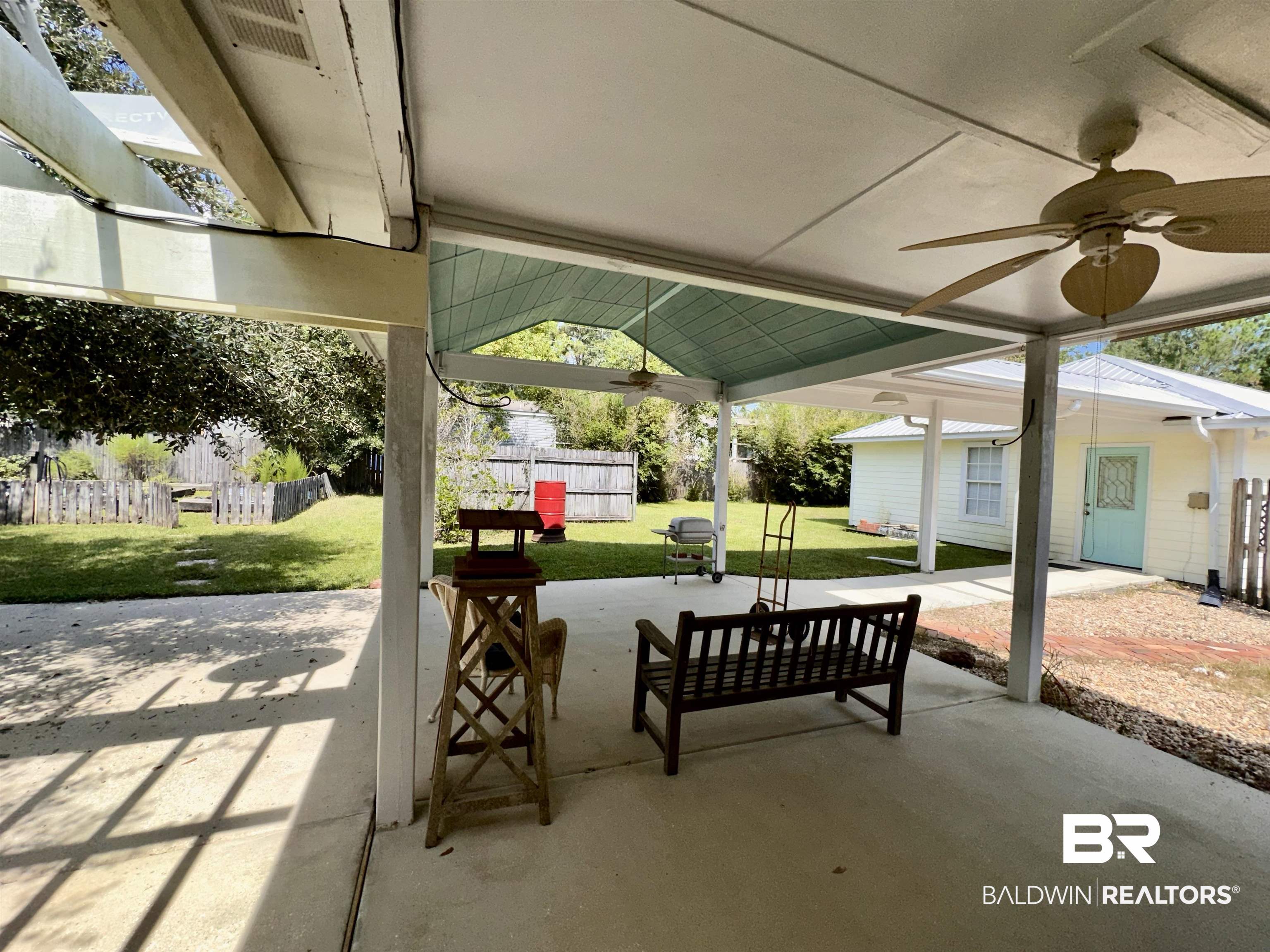 9101 Coronada Road Elberta, AL 36530 - Photo 16 of 27 View of patio featuring ceiling fan