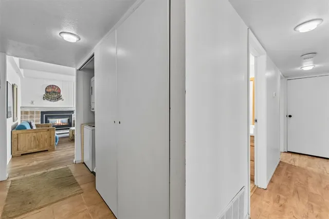 a view of room with furniture and wooden floor