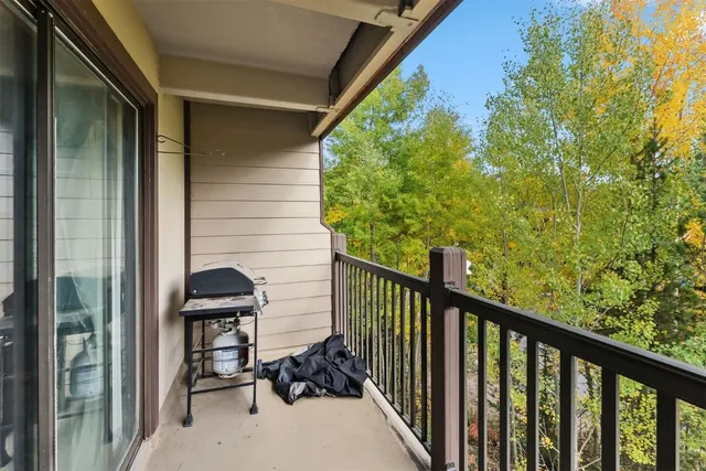 a view of balcony with furniture