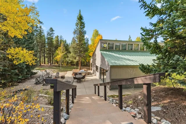 a view of a tables and chairs in a patio