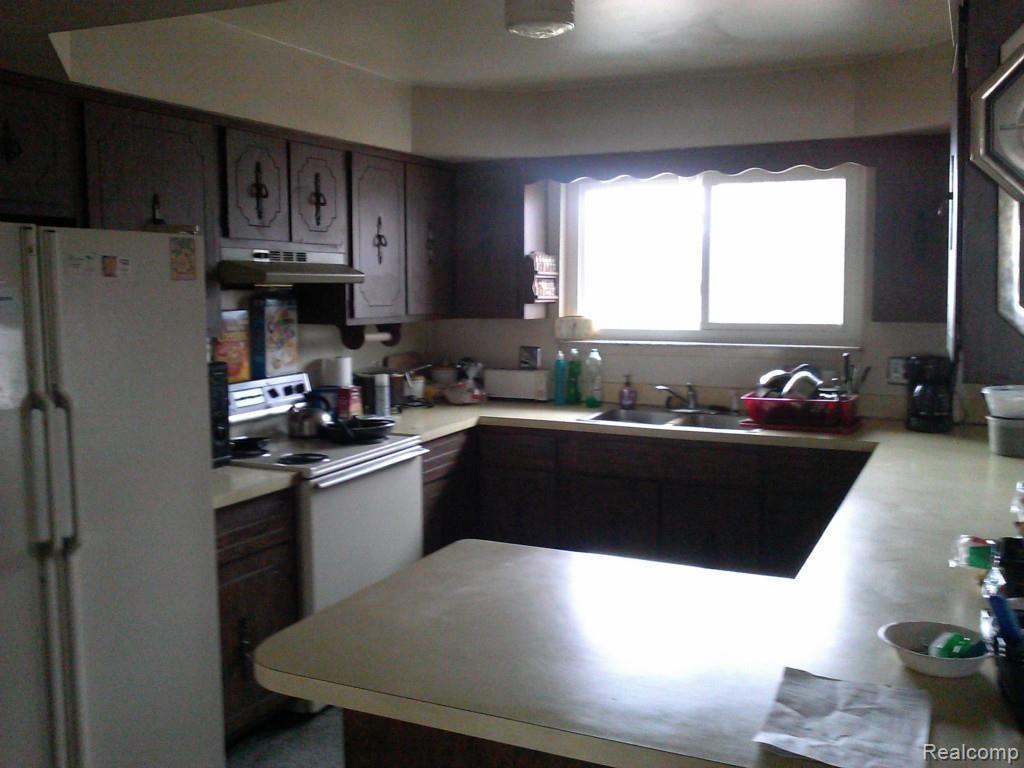9260 Springborn Road Casco, MI 48064 - Photo 13 of 29 Tidy kitchen on main floor