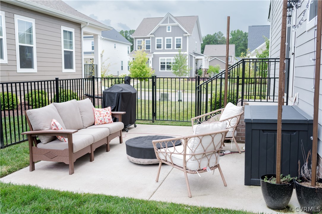 704 Vaughan Road Ashland, VA 23005 - Photo 17 of 19 Side Yard Complete w/ Concrete Patio
