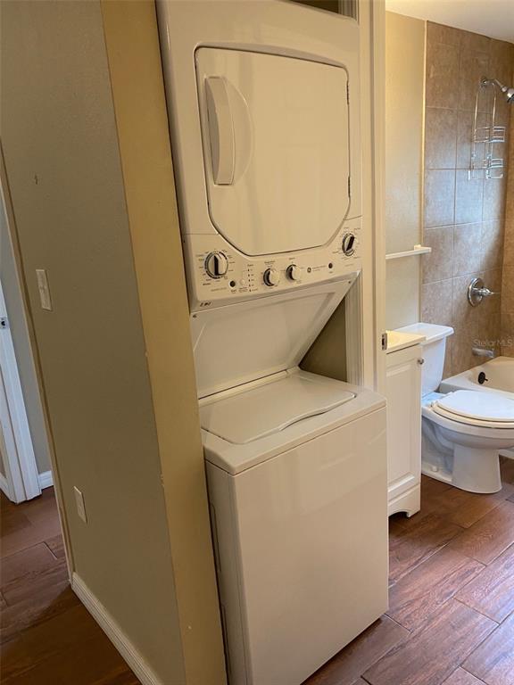 1002 East McDonald Avenue, Unit 4 Eustis, FL 32726 - Photo 11 of 13 a utility room with dryer and washer