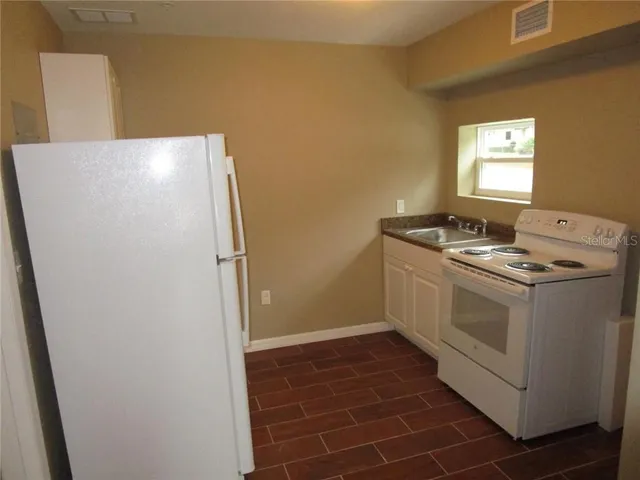 a utility room with washer and dryer