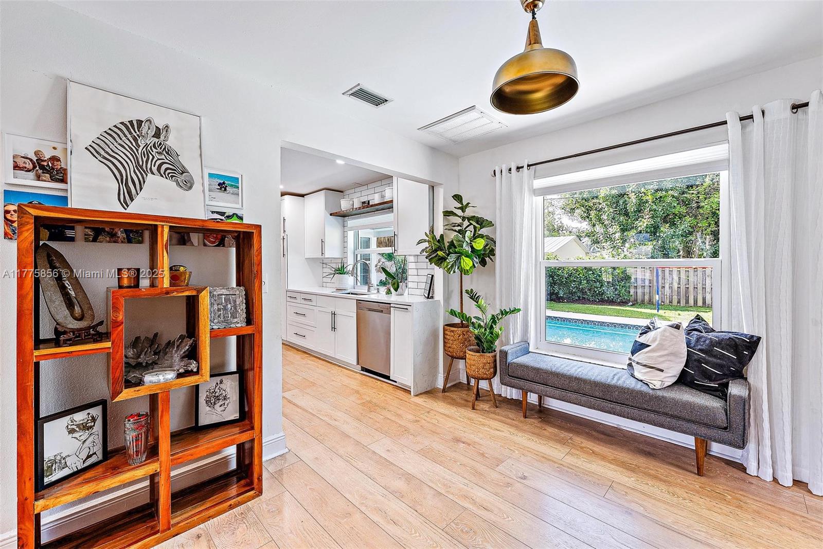 226 Norfolk Road Jupiter, FL 33469 - Photo 7 of 33 Living Area Overlooking Pool