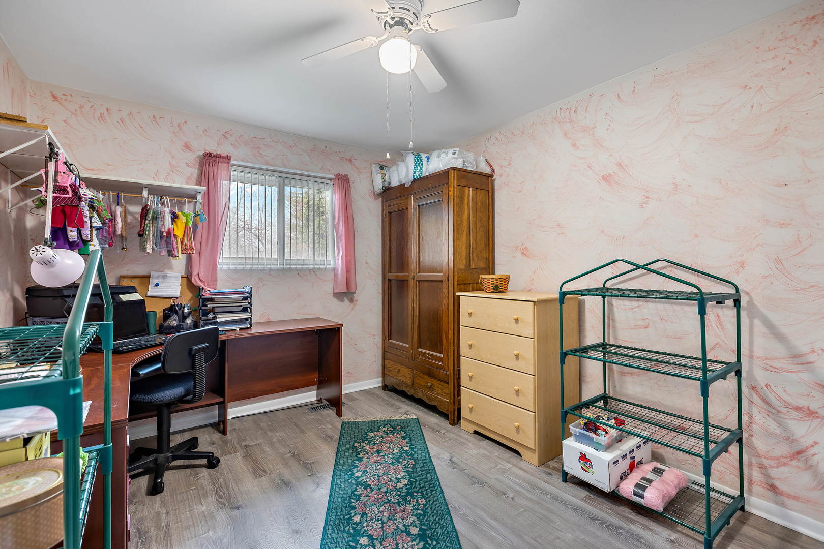 536 White Oak Road Bolingbrook, IL 60440 - Photo 5 of 16 a view of a workspace with furniture and a window