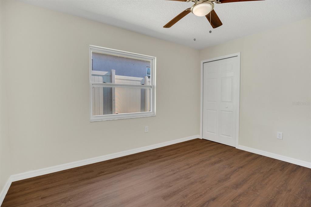 5357 Sunrise Boulevard Orlando, FL 32803 - Photo 15 of 26 a view of empty room with wooden floor
