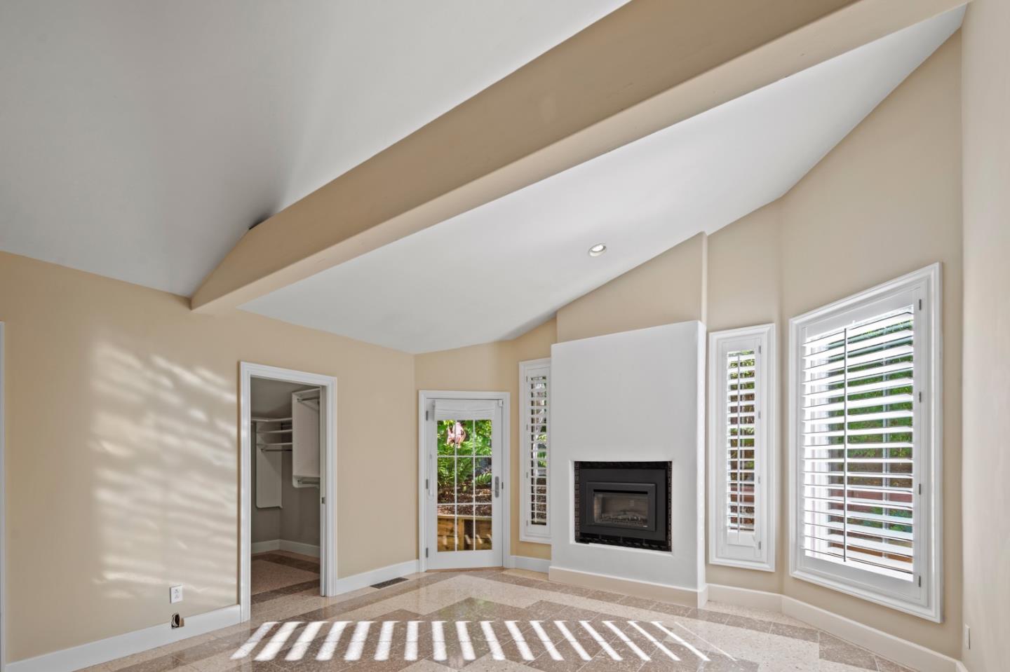 2903 Colton Road Pebble Beach, CA 93953 - Photo 16 of 32 a bedroom with a bed and a fireplace