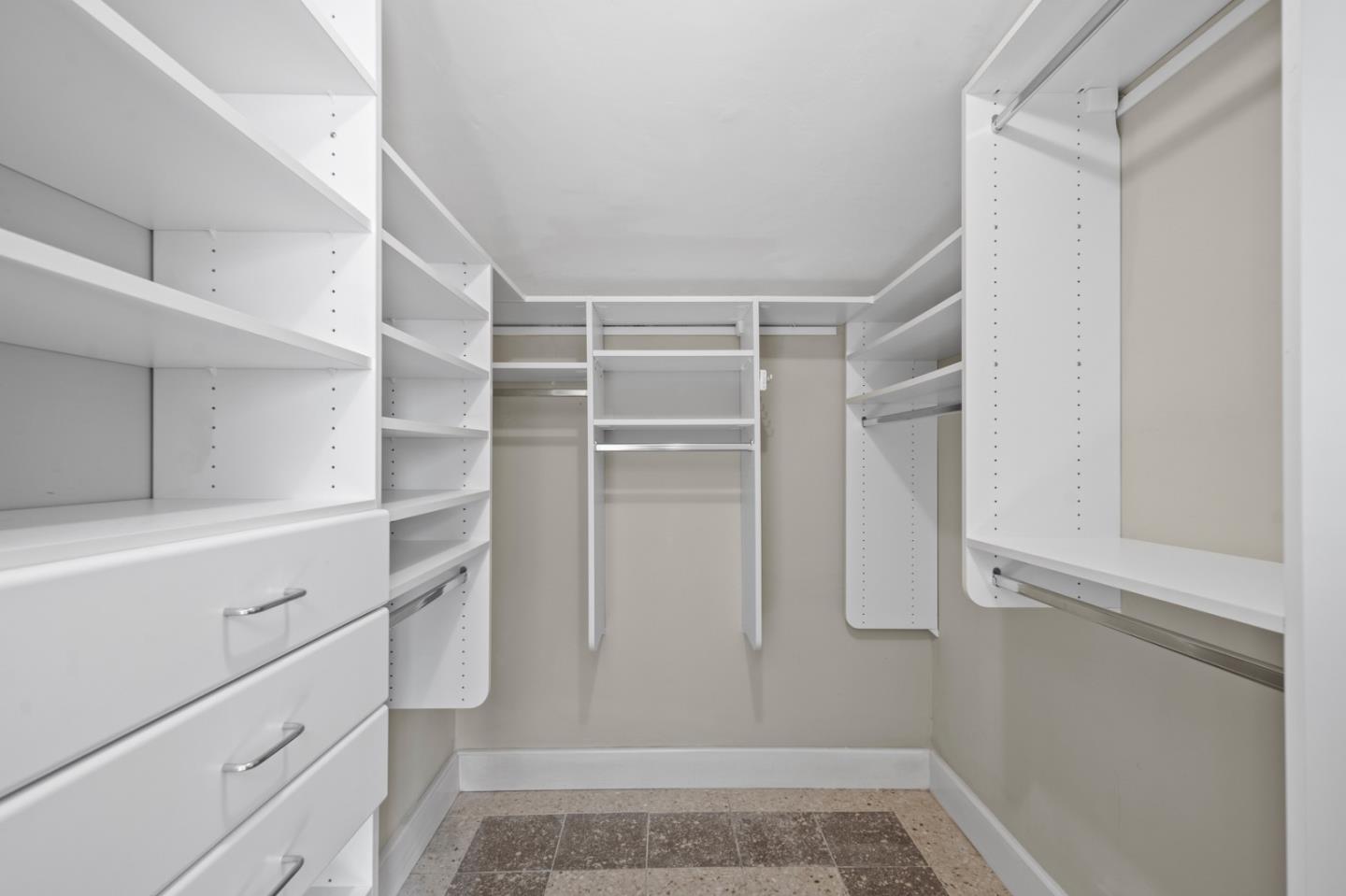 2903 Colton Road Pebble Beach, CA 93953 - Photo 17 of 32 a view of walk in closet with empty racks