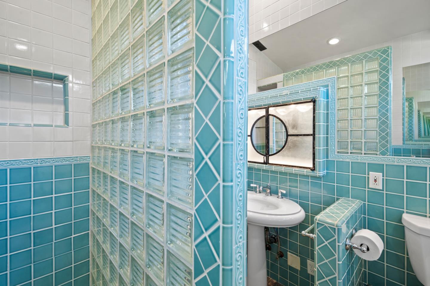 2903 Colton Road Pebble Beach, CA 93953 - Photo 23 of 32 a bathroom with a sink a toilet and shower