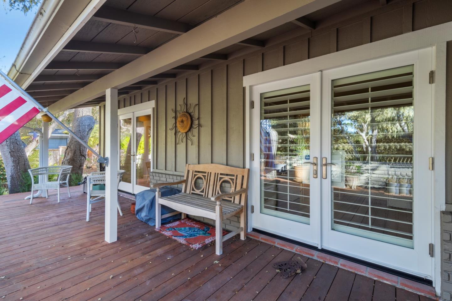 2903 Colton Road Pebble Beach, CA 93953 - Photo 24 of 32 a view of deck with a table and chairs and wooden floor