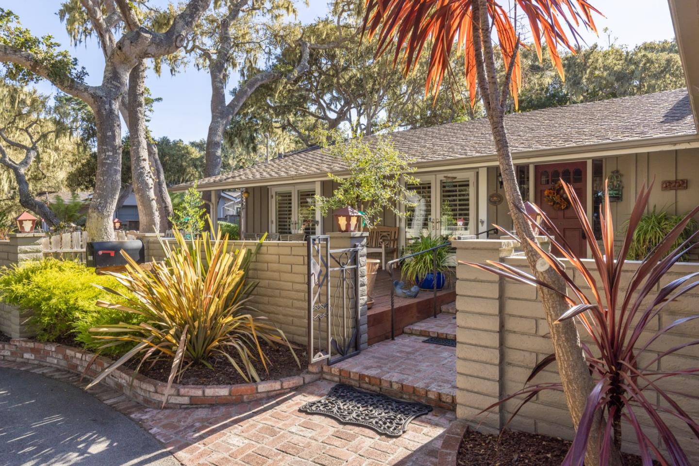 2903 Colton Road Pebble Beach, CA 93953 - Photo 4 of 32 front view of a house with a tree