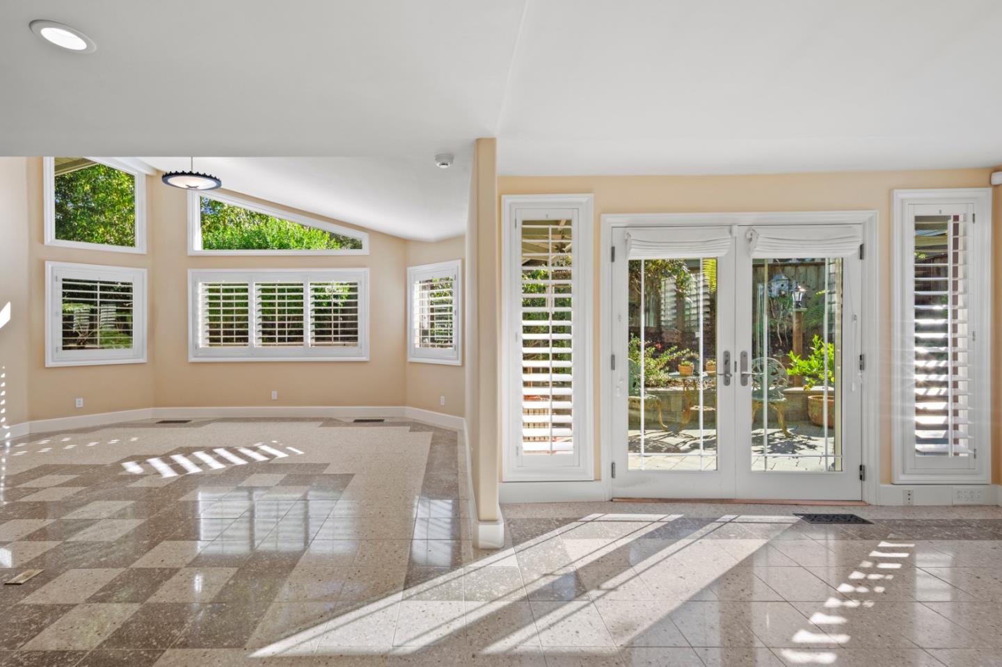 2903 Colton Road Pebble Beach, CA 93953 - Photo 8 of 32 a view of a bedroom with a bed and wooden floor