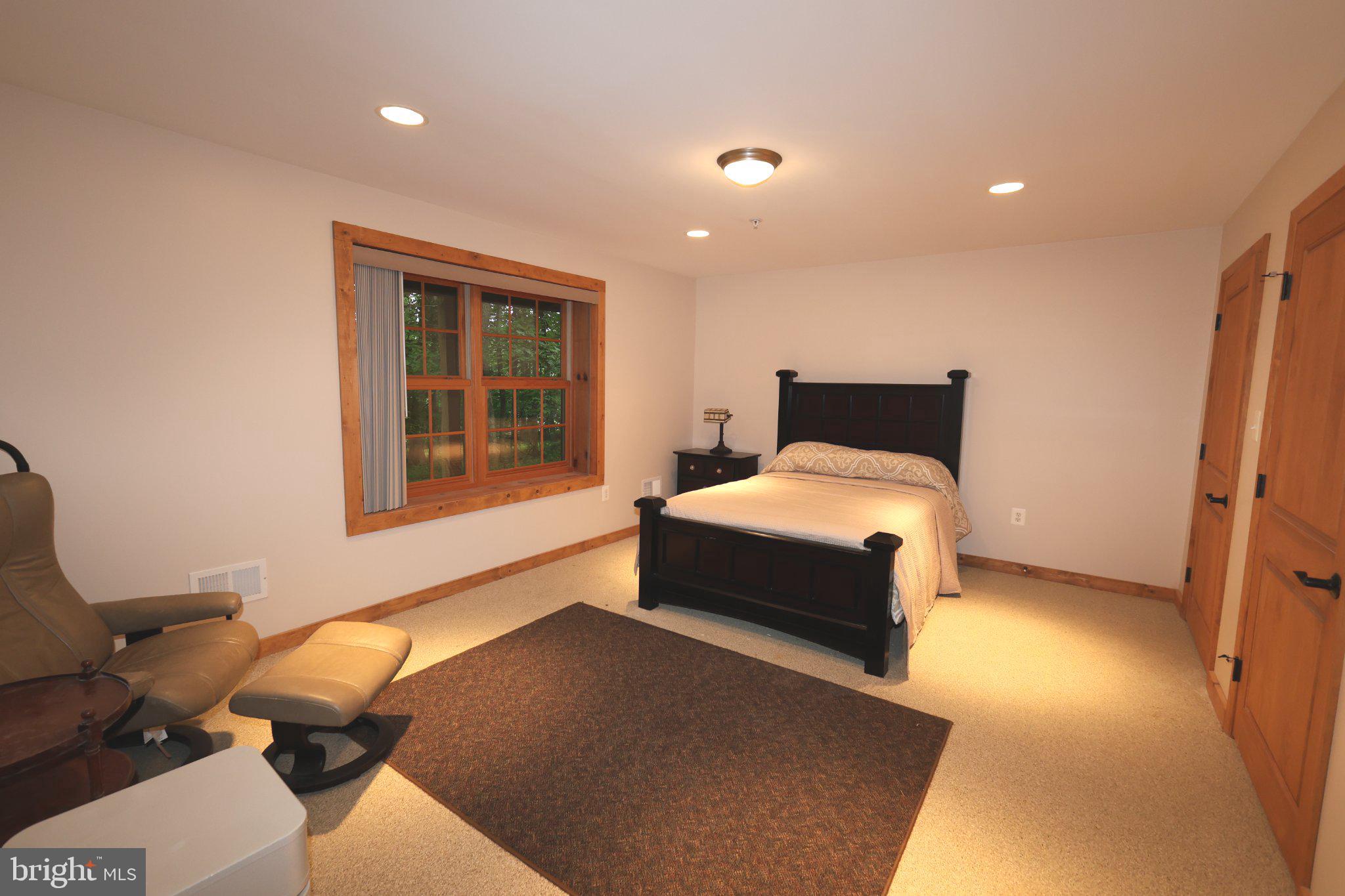 14520 Ridenour Road Smithsburg, MD 21783 - Photo 21 of 37 Serene bedroom with natural light.