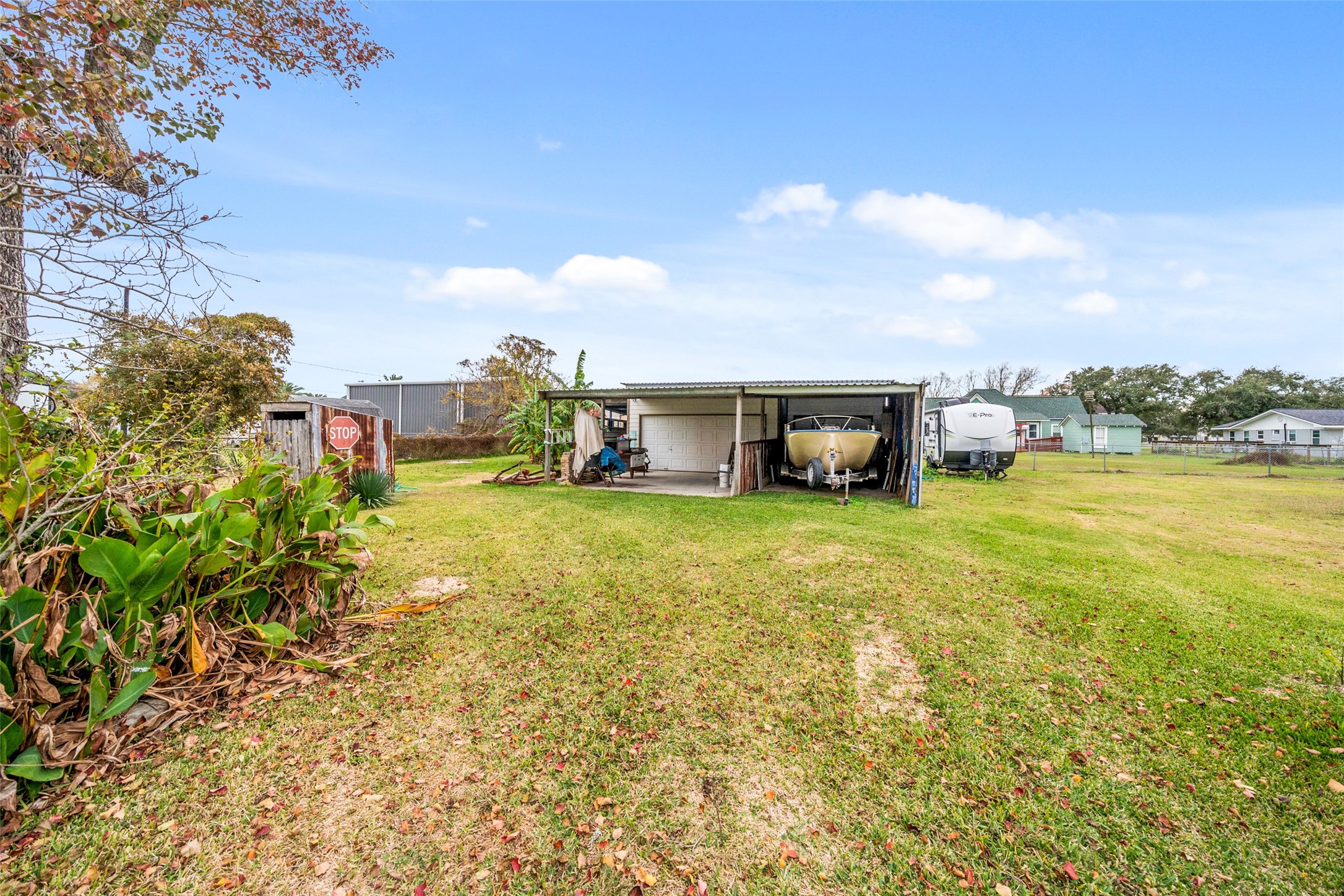 695 Wightman Street Matagorda, TX 77457 - Photo 4 of 40 a view of a house with a yard and sitting area