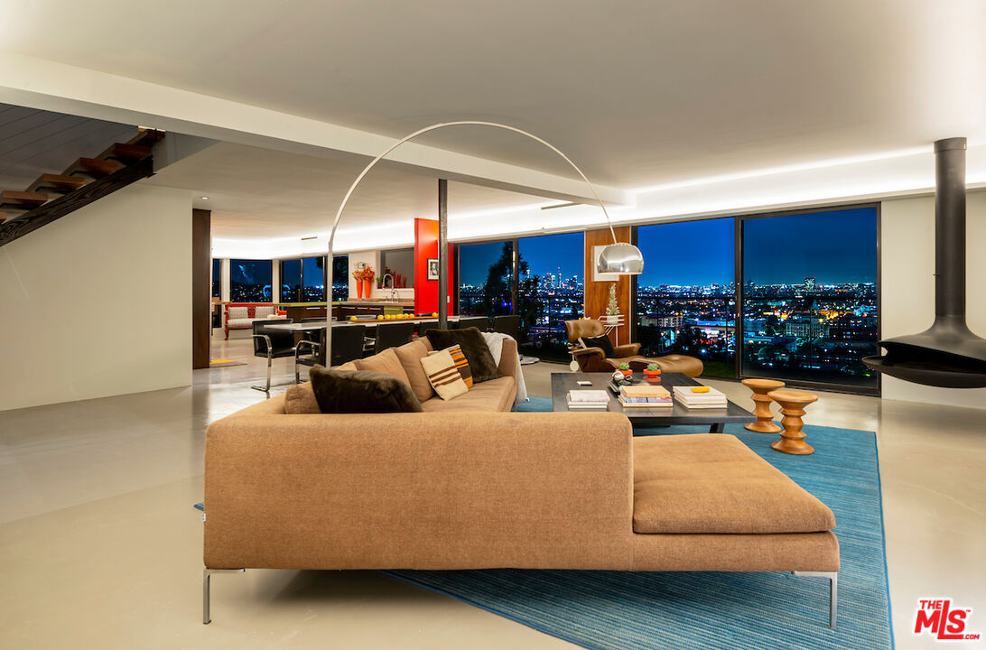 5668 Tryon Road Los Angeles, CA 90068 - Photo 2 of 21 a living room with furniture kitchen view and a large window