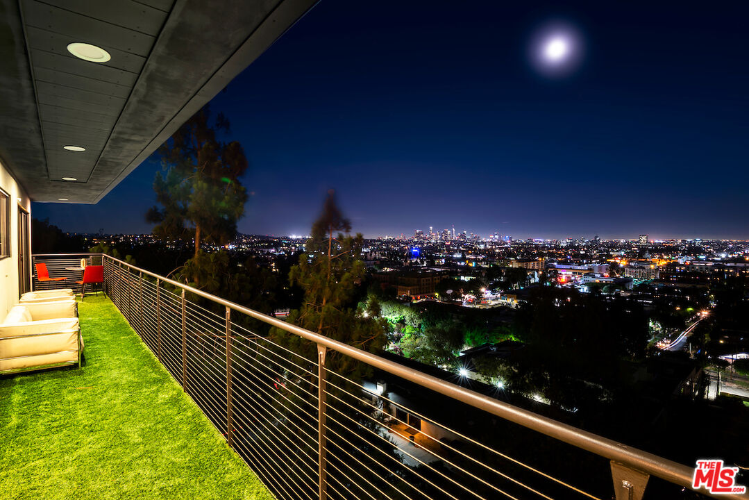5668 Tryon Road Los Angeles, CA 90068 - Photo 3 of 21 a view of swimming pool from a balcony