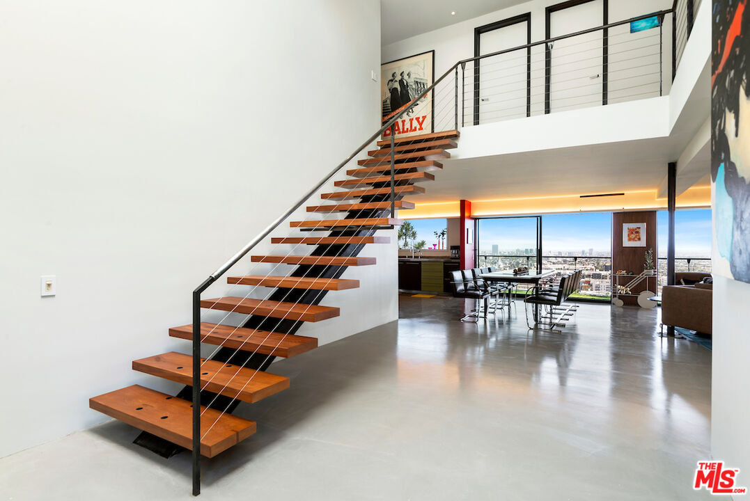 5668 Tryon Road Los Angeles, CA 90068 - Photo 6 of 21 a view of entryway and hall with wooden floor
