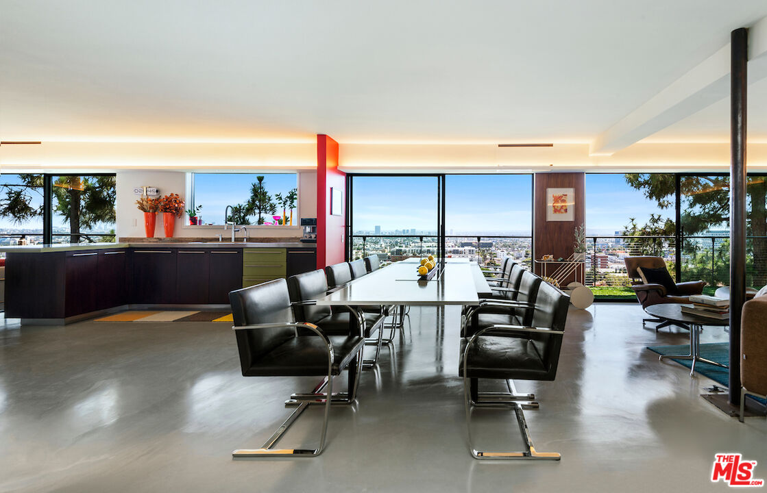 5668 Tryon Road Los Angeles, CA 90068 - Photo 9 of 21 a view of a workspace with furniture and a livingroom