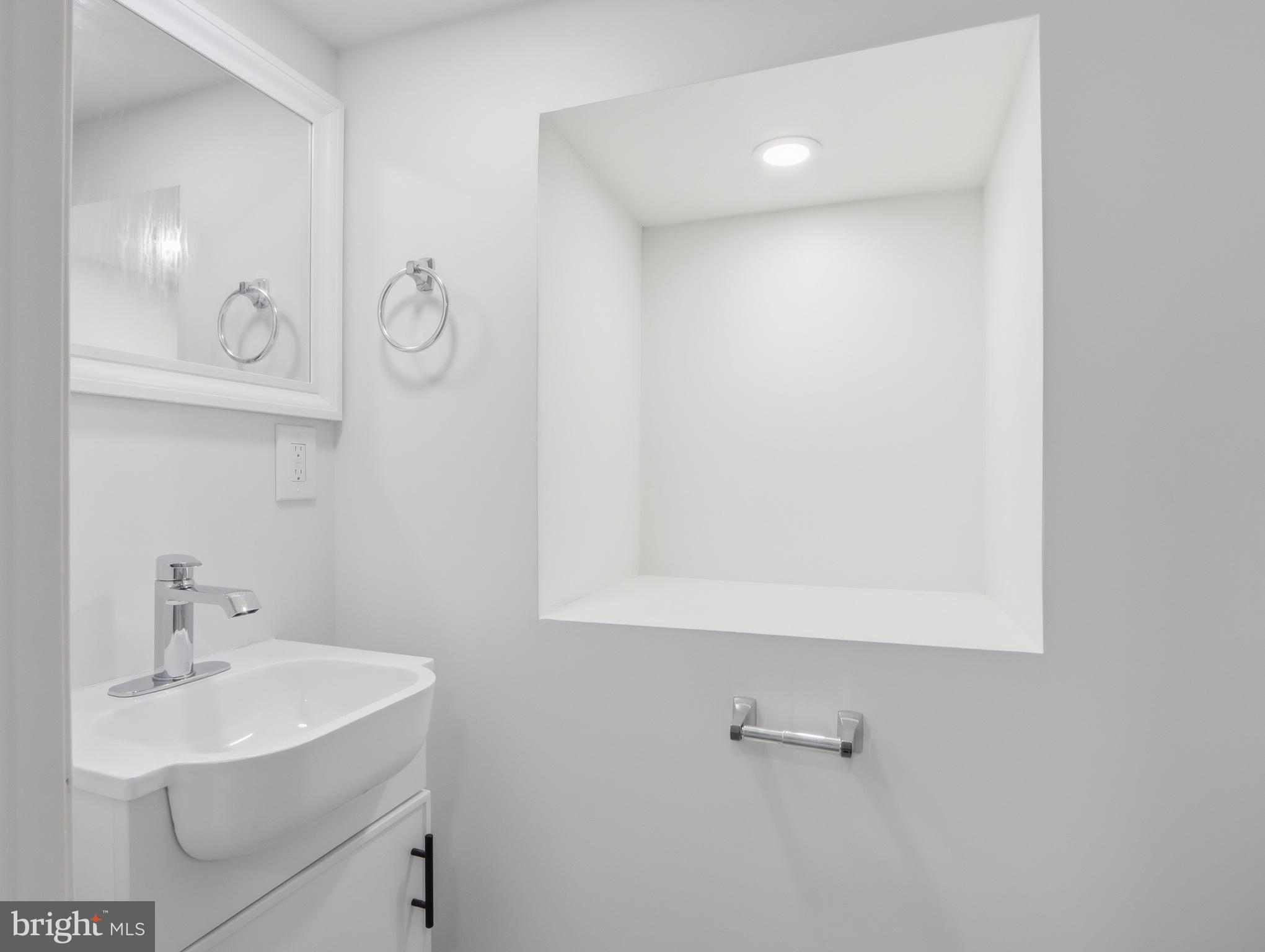 6008 Clearspring Road Baltimore, MD 21212 - Photo 31 of 63 New lower level powder room