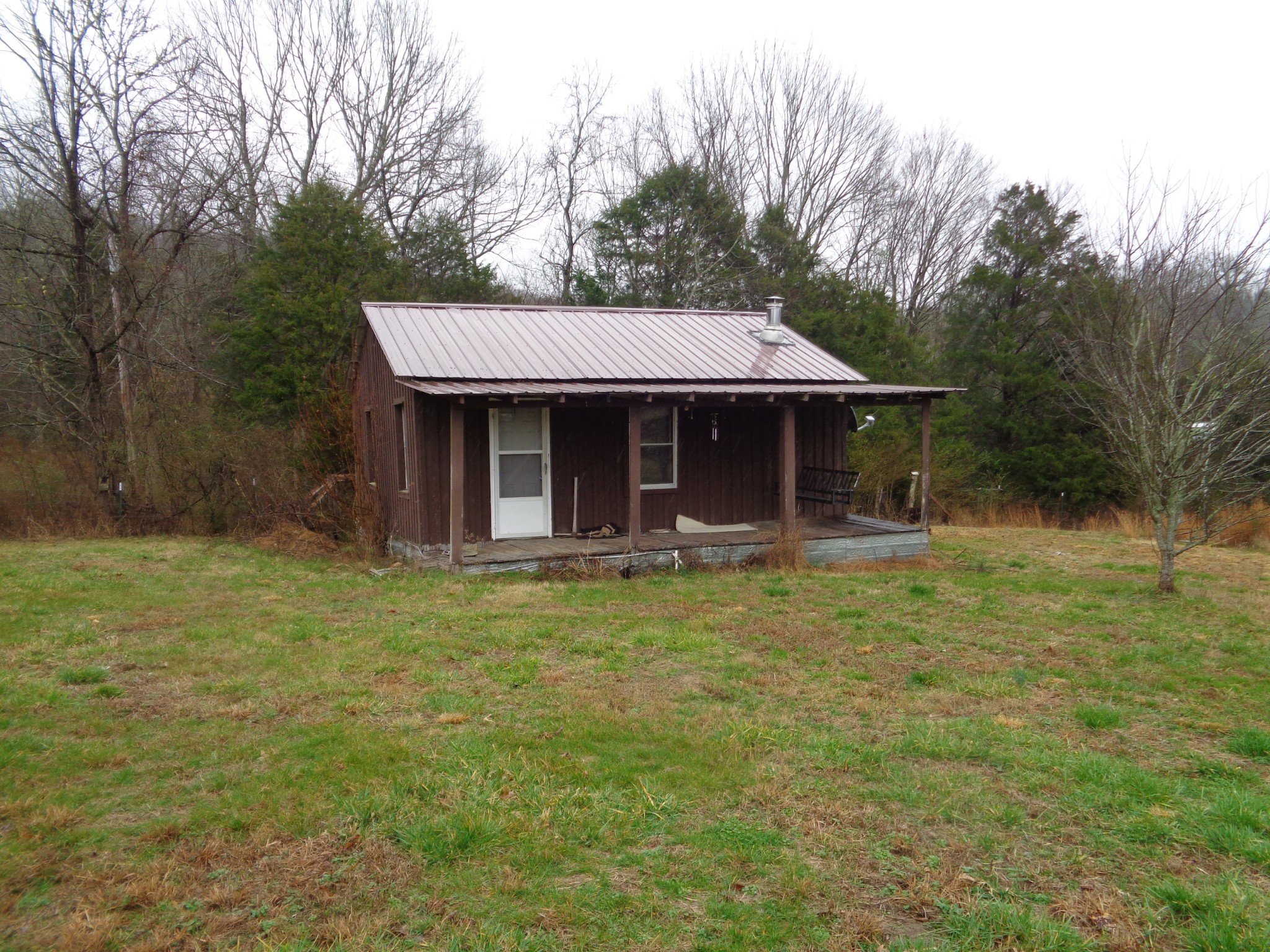 440 Stella Church Road Prospect, TN 38477 - Photo 1 of 18 a front view of a house with a garden