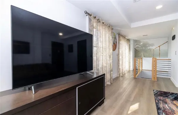 a hallway with wooden floor