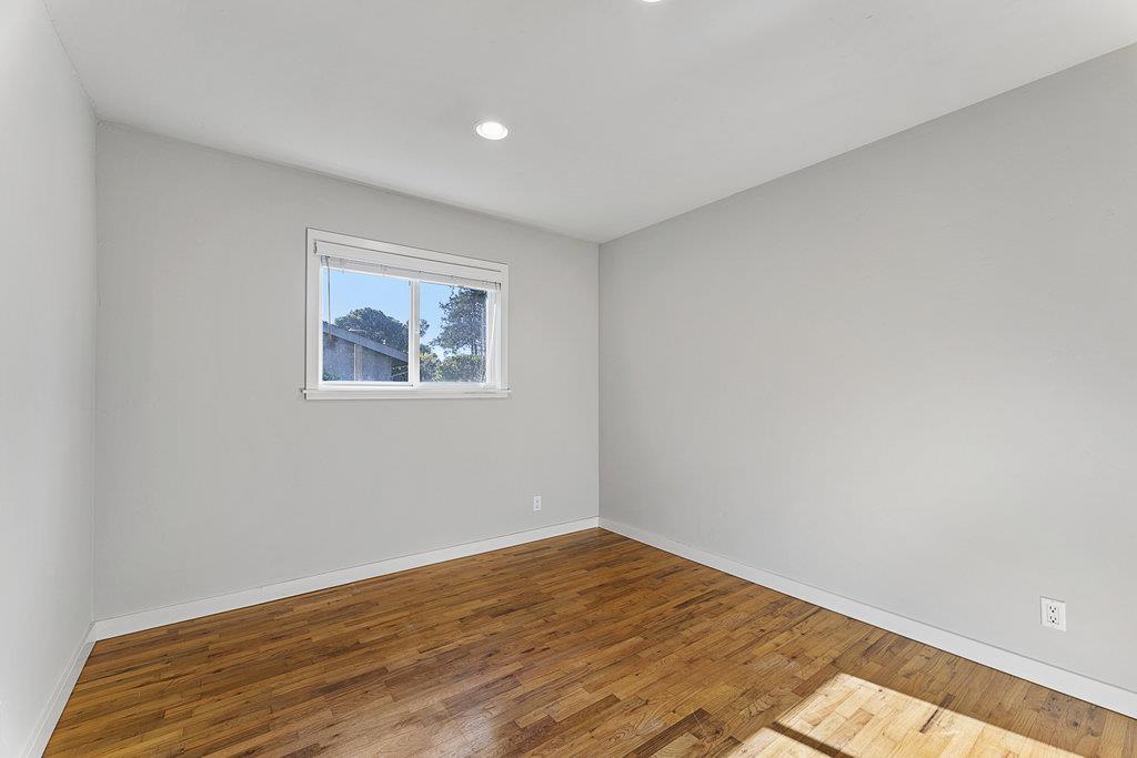 213 Siesta Drive Aptos, CA 95003 - Photo 24 of 33 a view of empty room with wooden floor