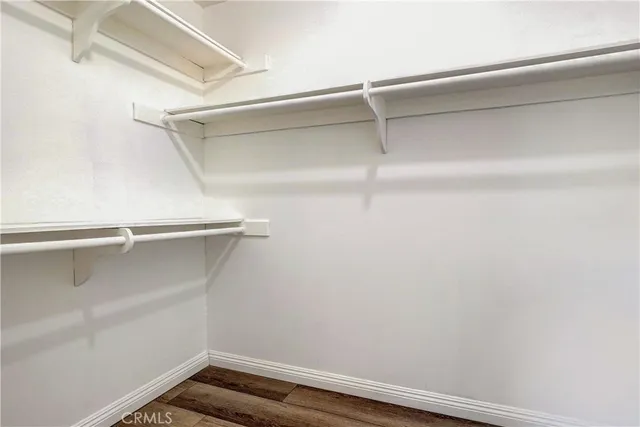 a view of an empty walk in closet