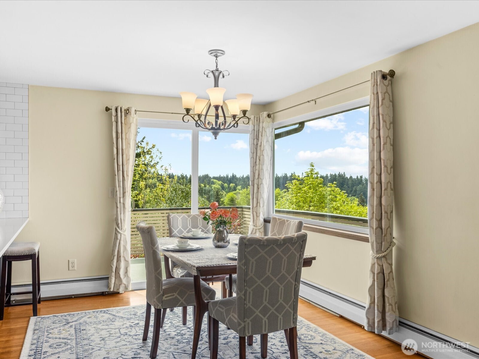 1401 Southwest 137th Street Burien, WA 98166 - Photo 12 of 40 a view of a dining room with furniture window and wooden floor