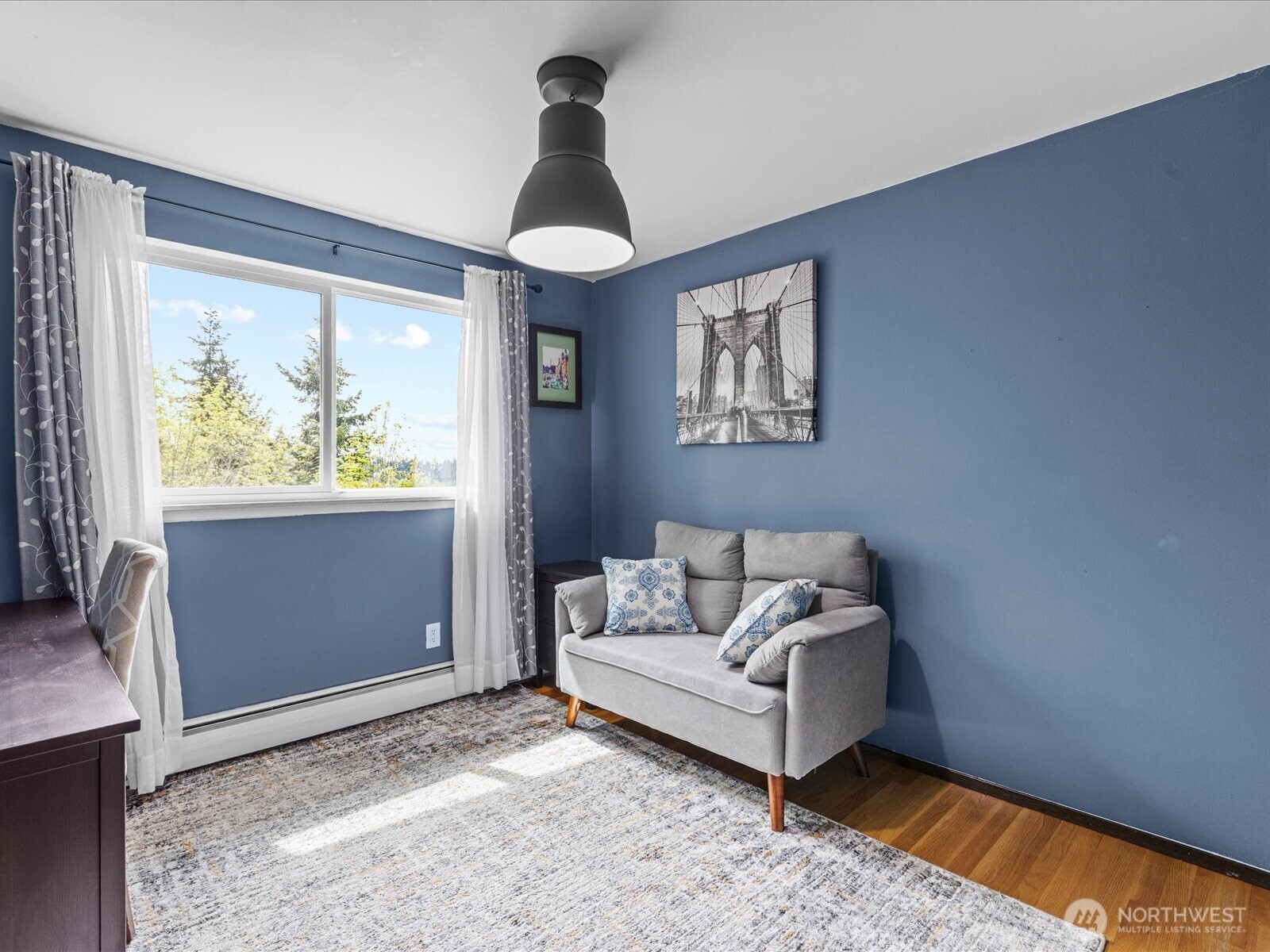 1401 Southwest 137th Street Burien, WA 98166 - Photo 23 of 40 a living room with furniture and a window