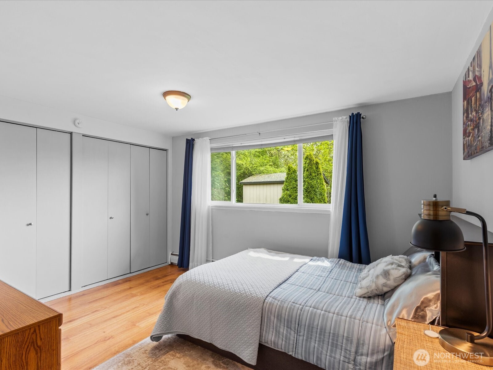 1401 Southwest 137th Street Burien, WA 98166 - Photo 33 of 40 a bedroom with a bed and a window